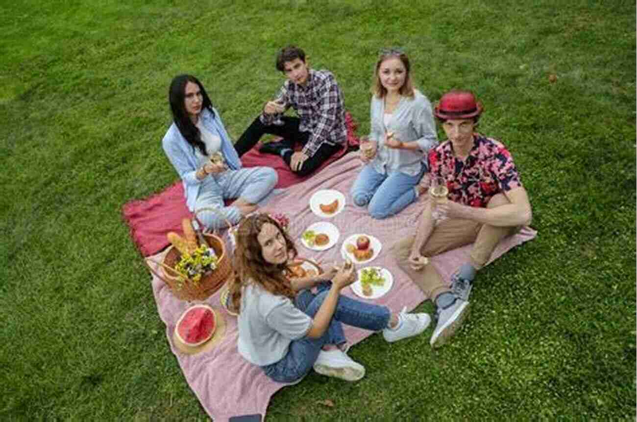 A Group Of Friends Enjoying A Picnic In The Park, Fully Present And Engaged With One Another The Friendship Factor: How To Get Closer To The People You Care For