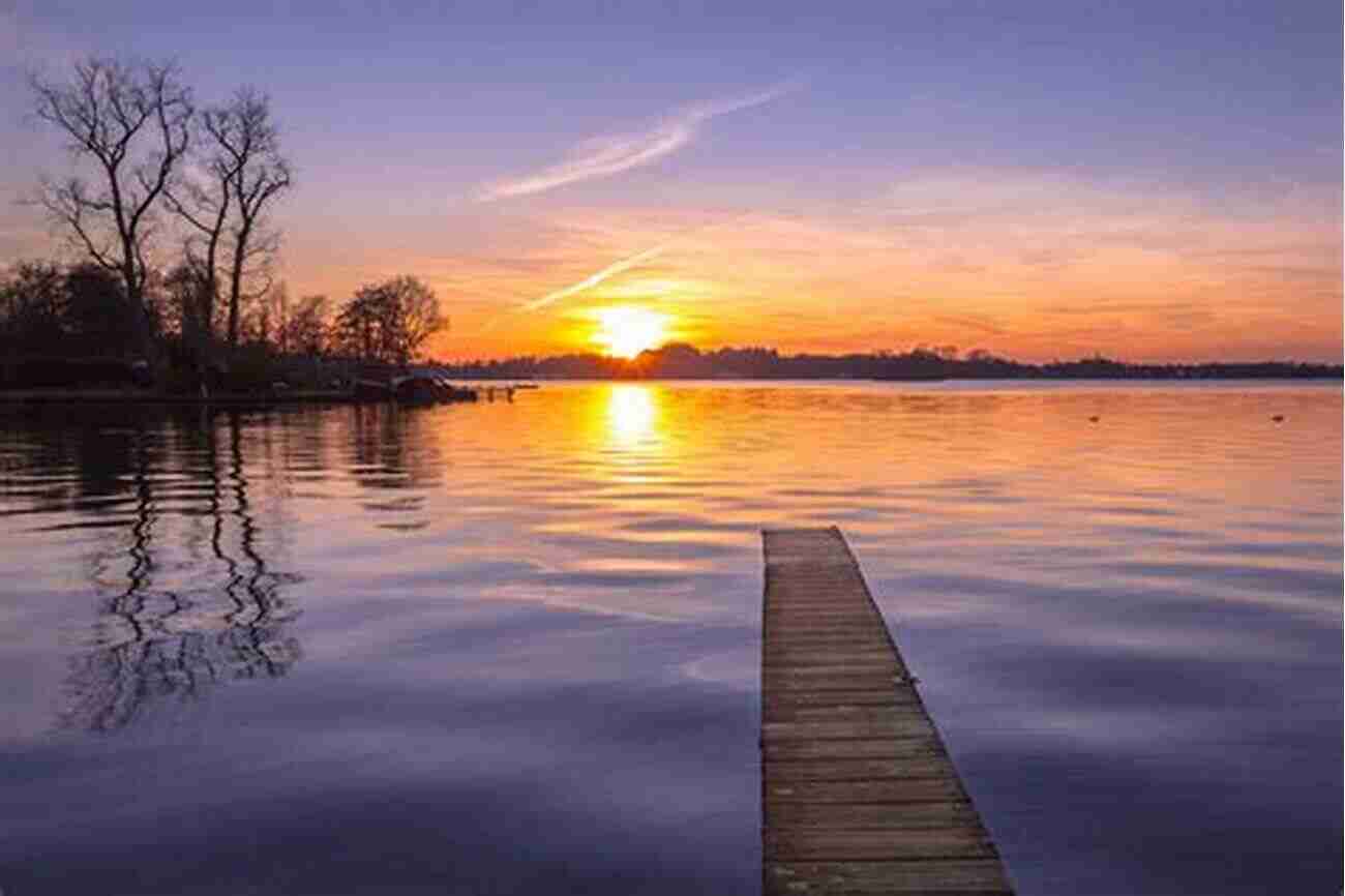 An Image Depicting A Picturesque Sunset Over A Serene Lake The Nature Magpie: A Cornucopia Of Facts Anecdotes Folklore And Literature From The Natural World (Icon Magpie)