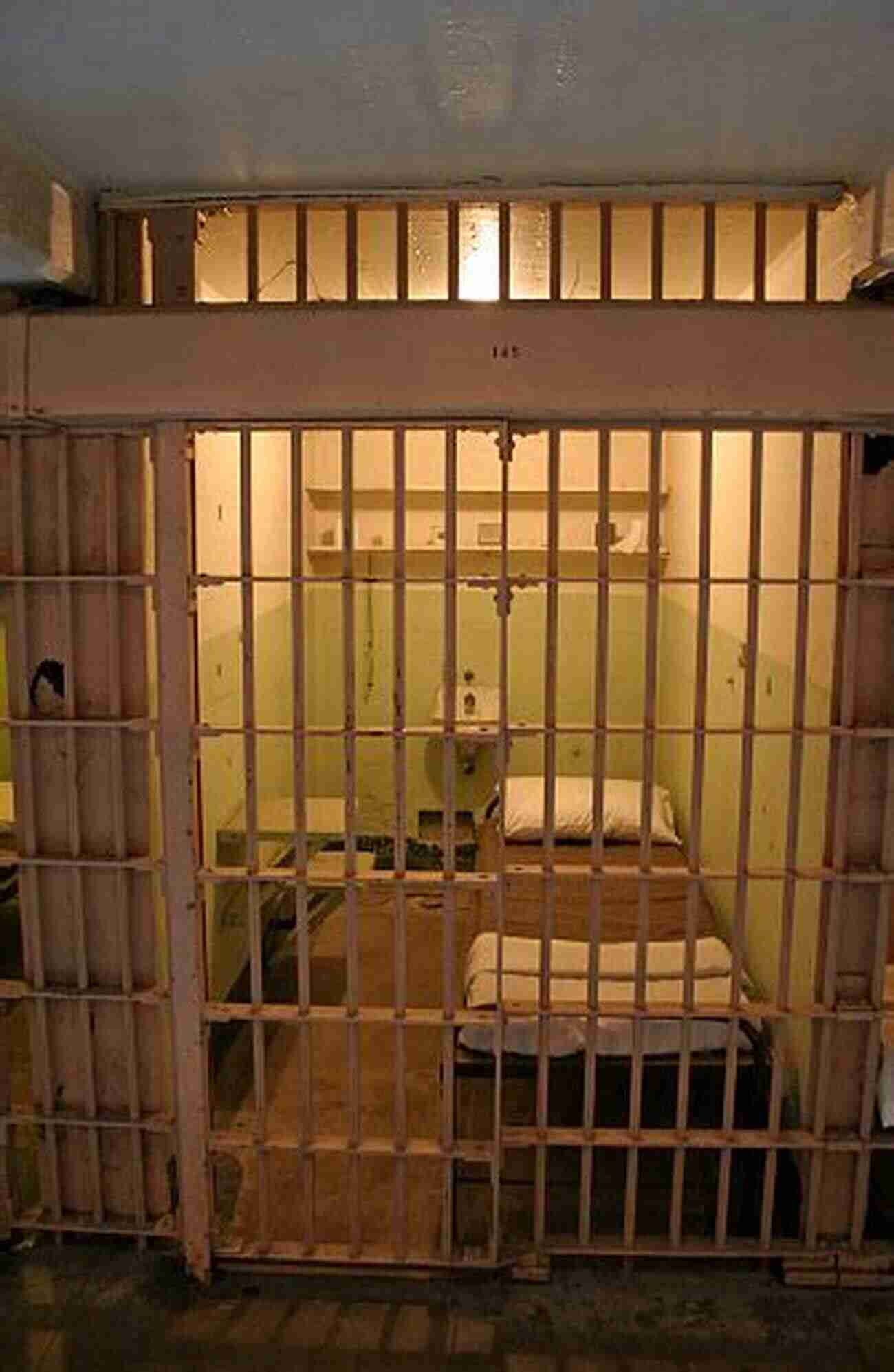 Blake Jackson's Gloomy Prison Cell, The Iron Bars Representing His Inescapable Fate The Prisoner Blake Jackson