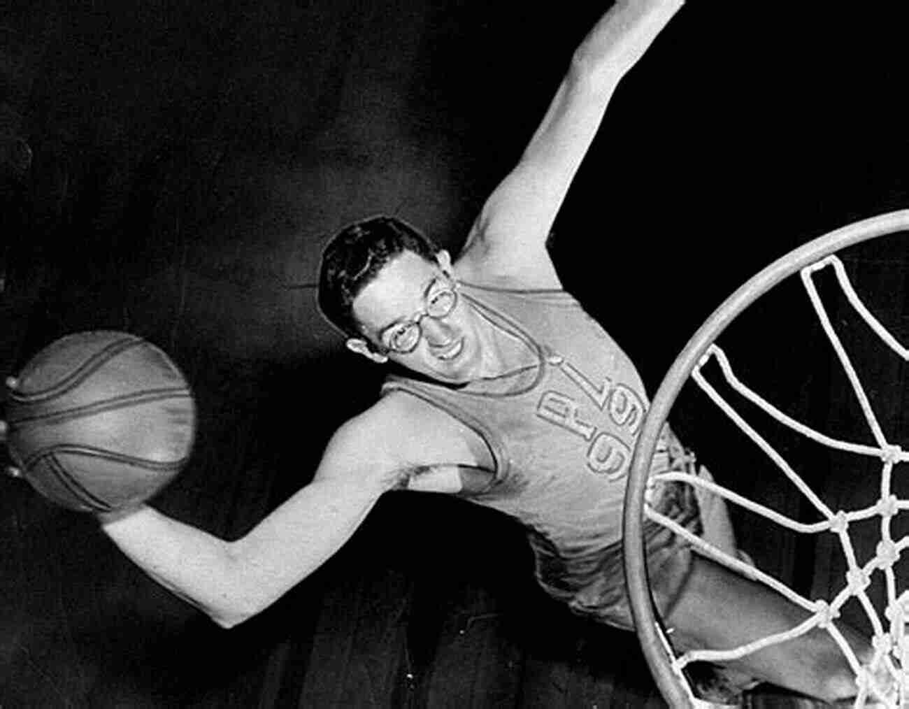 George Mikan Making A Powerful Slam Dunk During A Basketball Game George Mikan S Profile Career: All About Mr Basketball George Mikan: George Mikan