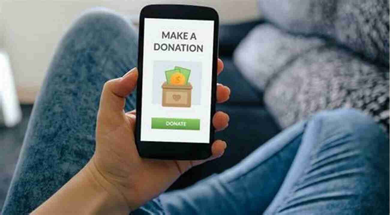 Hand Holding A Donation Button YouTube Sponsorships: How Creators Like You Can Fund Your Channel