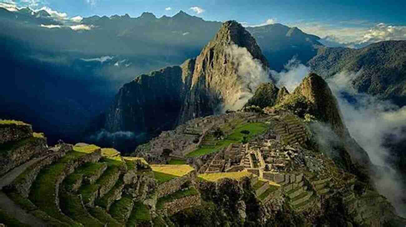 Stunning View Of Machu Picchu With Misty Mountains In The Background Peru Travel Guide With 100 Landscape Photos