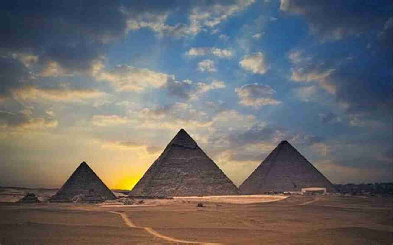 The Majestic Egyptian Pyramids Standing Tall Against The Backdrop Of A Golden Sunset. Owly Owls Most Popular Owls Of The World: Fun Facts And Pictures For Kids