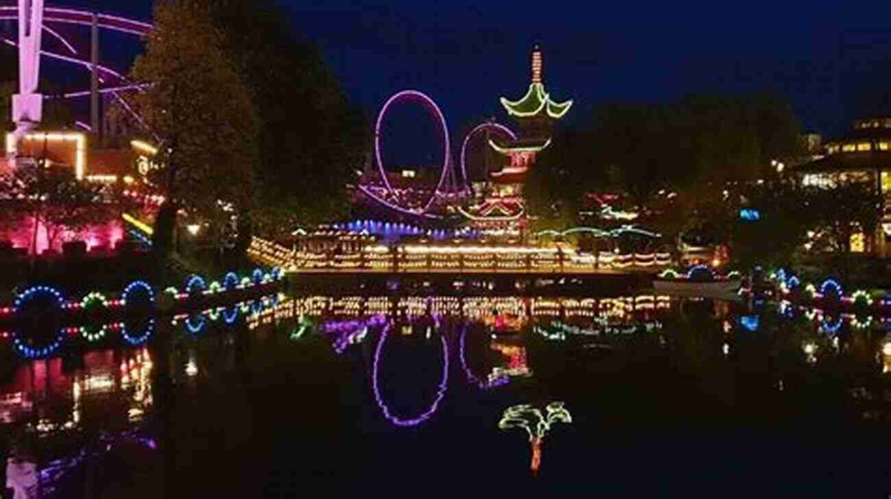 Tivoli Gardens At Night With Illuminated Attractions Time Out Copenhagen (Time Out Guides)