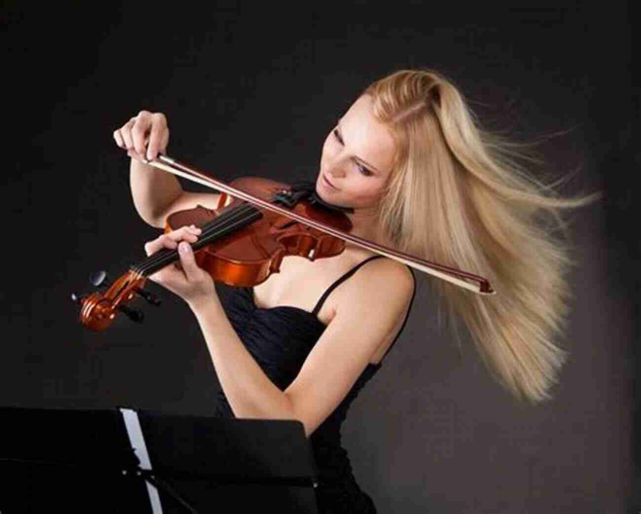 Young Violinist Passionately Playing The Violin Solos For Young Violinists Vol 1